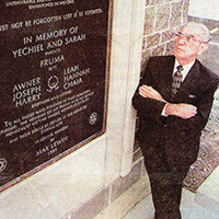 Max Lewin remembers his family at the Lewin Family Bell Tower.