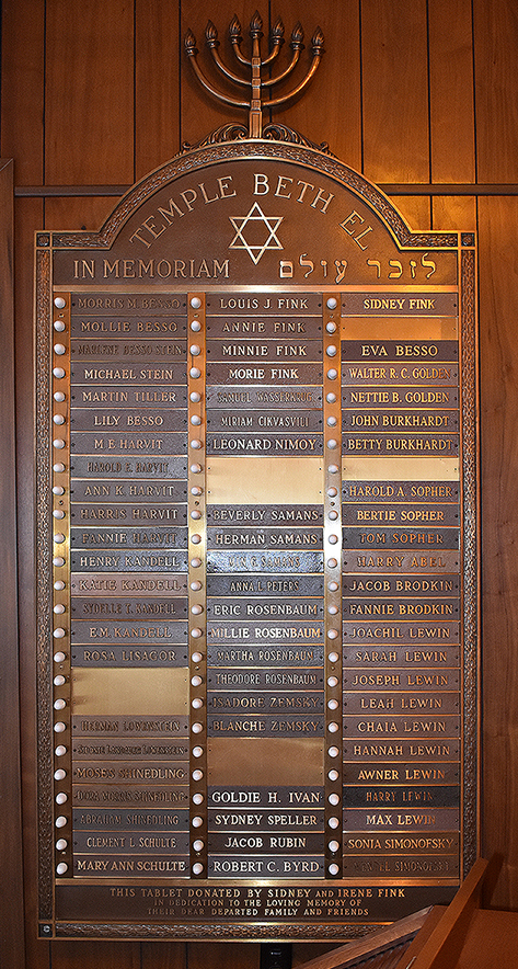 A memorial tablet at Temple Beth El listing the names of the Lewin family. 